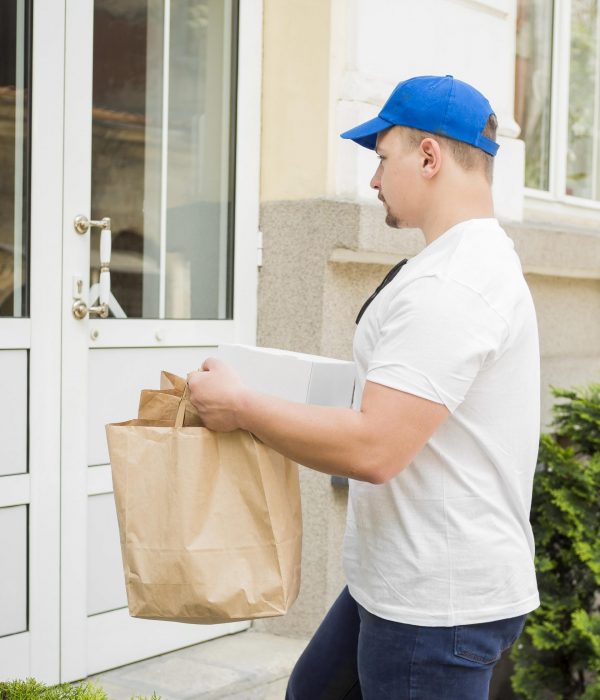 man-delivering-paper-bags